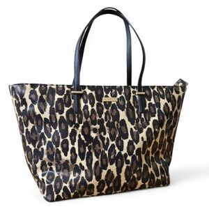 Kate Spade New York Harmony tote featuring a black and beige leopard print patte